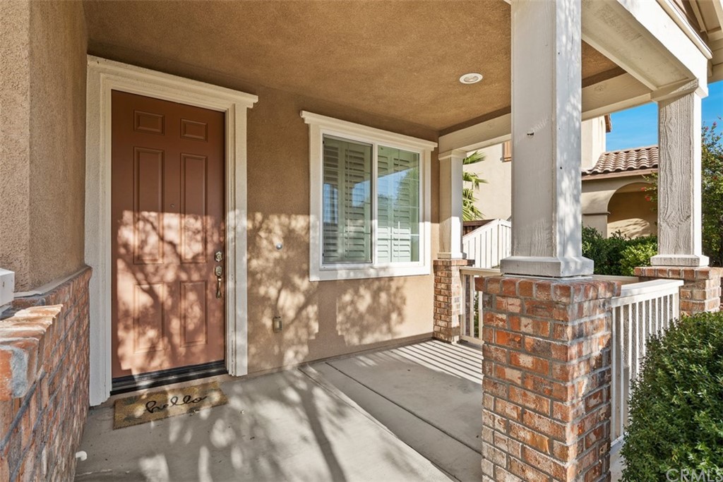 46945 Peach Tree Street Temecula, CA 92592 - Photo 3 of 32 a view of front door of house with stairs