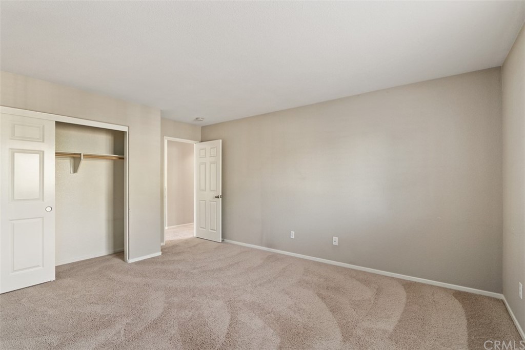 46945 Peach Tree Street Temecula, CA 92592 - Photo 23 of 32 a view of an empty room and closet area