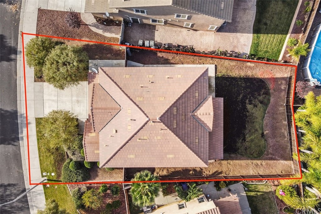46945 Peach Tree Street Temecula, CA 92592 - Photo 30 of 32 an aerial view of a house with a yard and potted plants