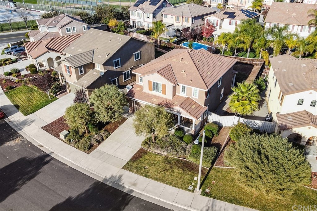 46945 Peach Tree Street Temecula, CA 92592 - Photo 32 of 32 an aerial view of multiple houses with yard