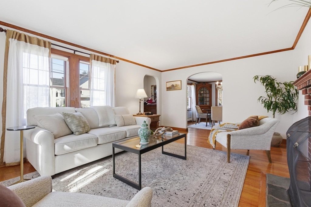 38 Morgan Avenue Wakefield, MA 01880 - Photo 18 of 39 a living room with furniture and a large window