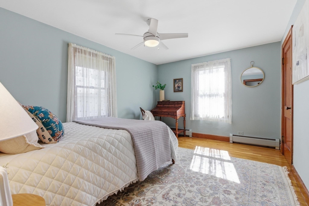 38 Morgan Avenue Wakefield, MA 01880 - Photo 19 of 39 a bedroom with a bed and window