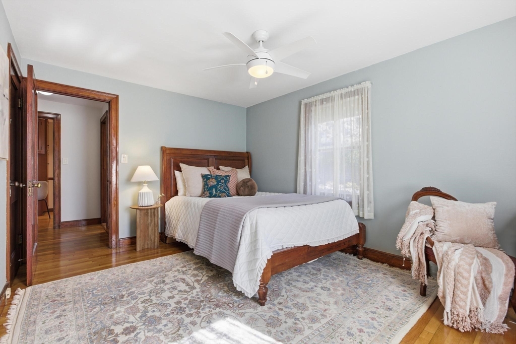 38 Morgan Avenue Wakefield, MA 01880 - Photo 20 of 39 a bedroom with a bed and a couch