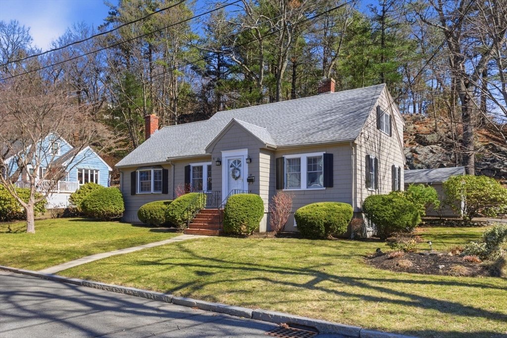 38 Morgan Avenue Wakefield, MA 01880 - Photo 2 of 39 a front view of a house with garden