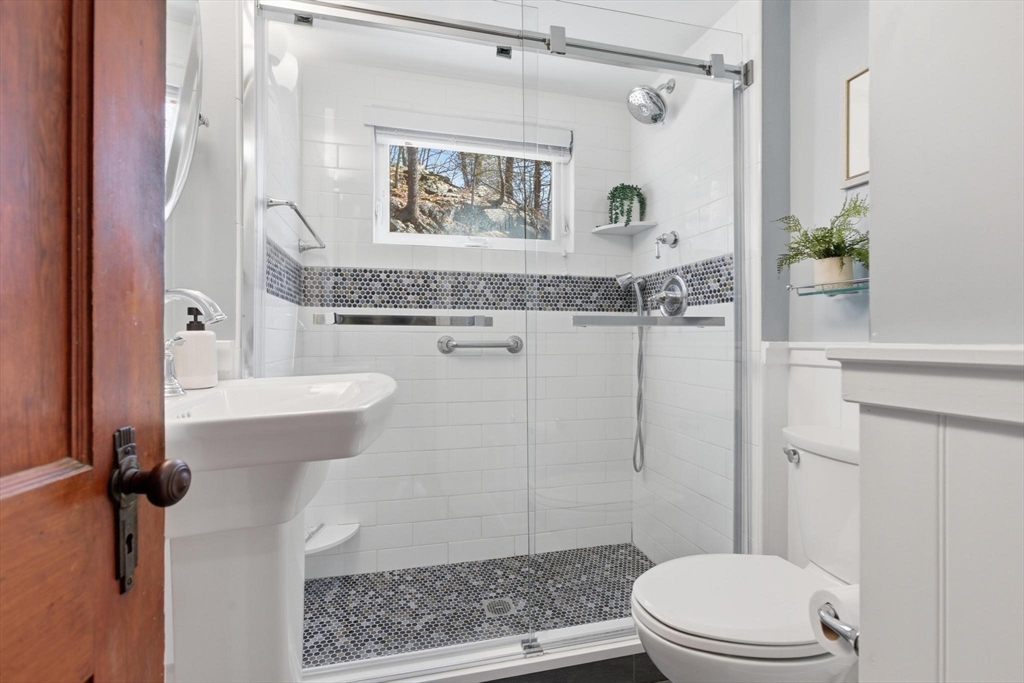 38 Morgan Avenue Wakefield, MA 01880 - Photo 21 of 39 a bathroom with a sink toilet and shower