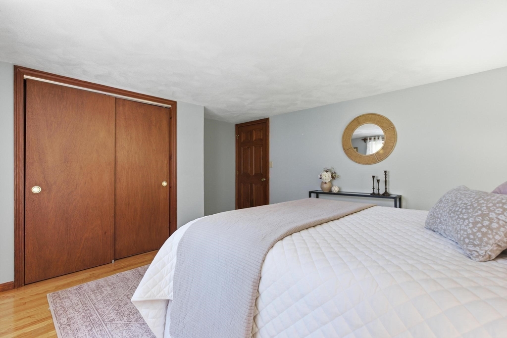 38 Morgan Avenue Wakefield, MA 01880 - Photo 24 of 39 a bedroom with a bed and a dresser