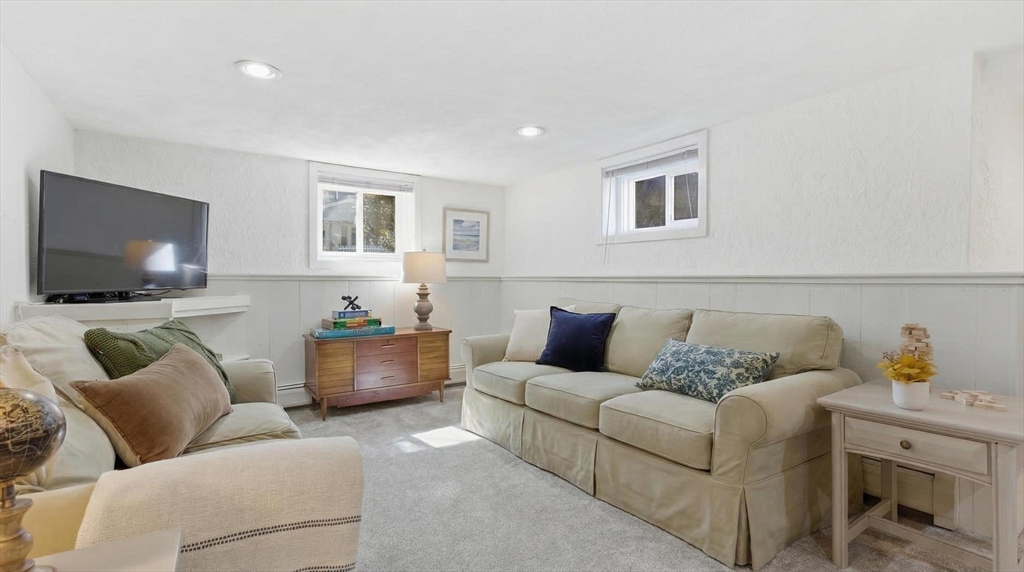38 Morgan Avenue Wakefield, MA 01880 - Photo 30 of 39 a living room with furniture and a flat screen tv