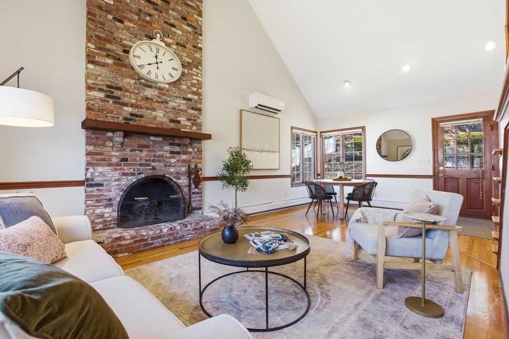 38 Morgan Avenue Wakefield, MA 01880 - Photo 3 of 39 a living room with furniture and a fireplace