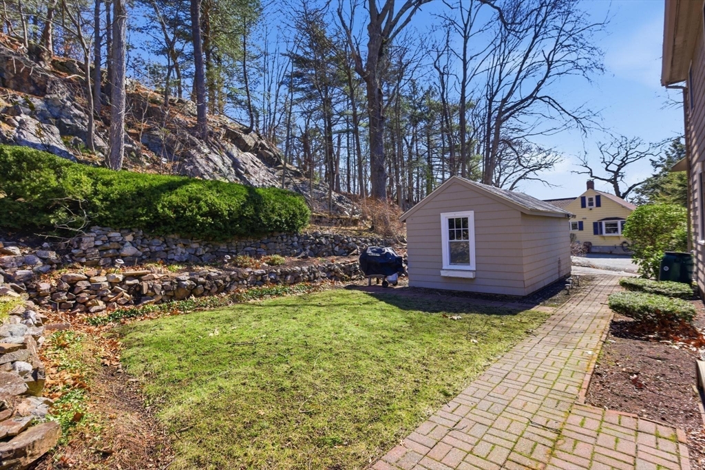 38 Morgan Avenue Wakefield, MA 01880 - Photo 34 of 39 a view of a backyard with large trees