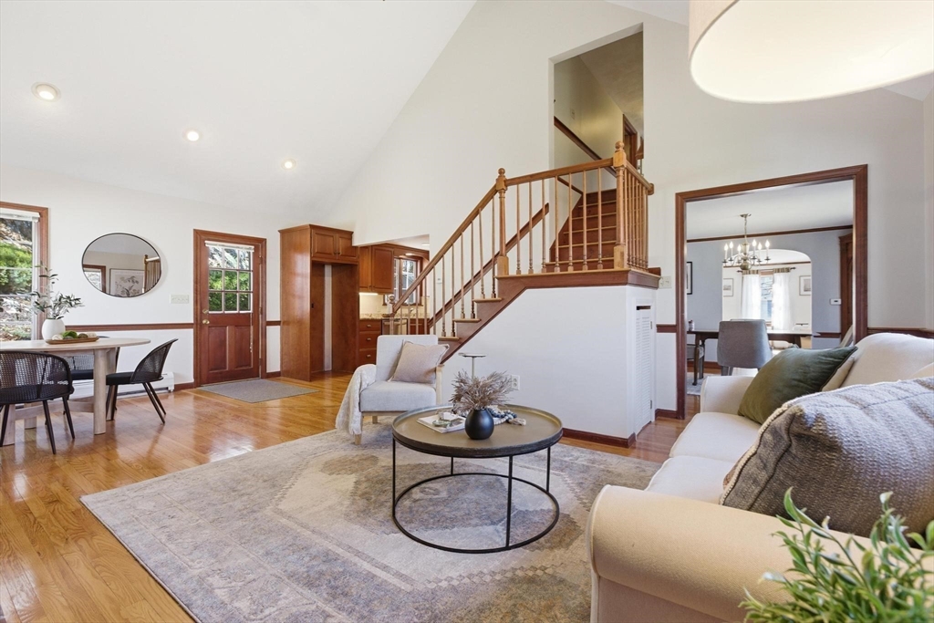 38 Morgan Avenue Wakefield, MA 01880 - Photo 4 of 39 a living room with furniture a table and wooden floor