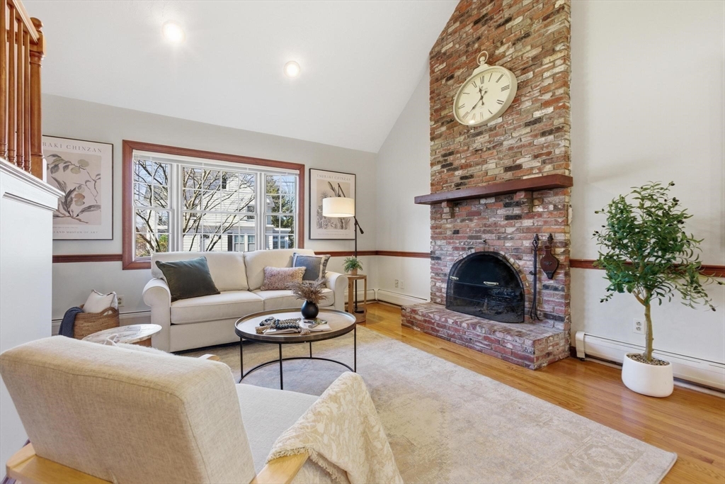 38 Morgan Avenue Wakefield, MA 01880 - Photo 7 of 39 a living room with furniture and a fireplace