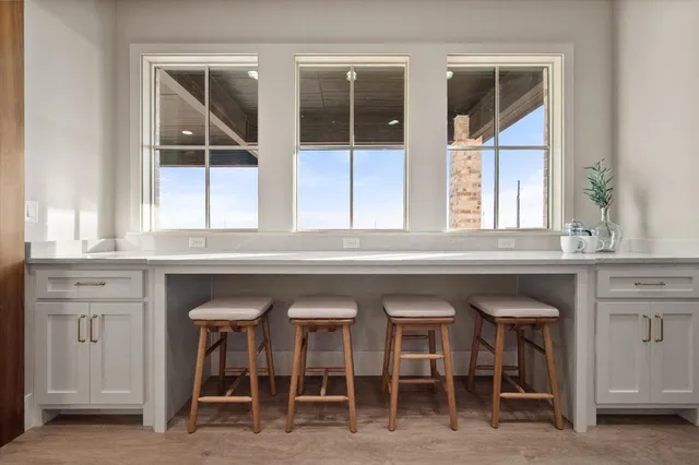 a kitchen with a sink and a window