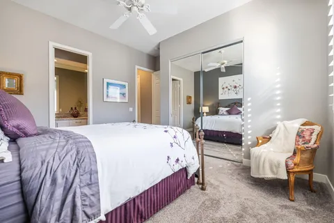 a view of a patio with a table and chairs