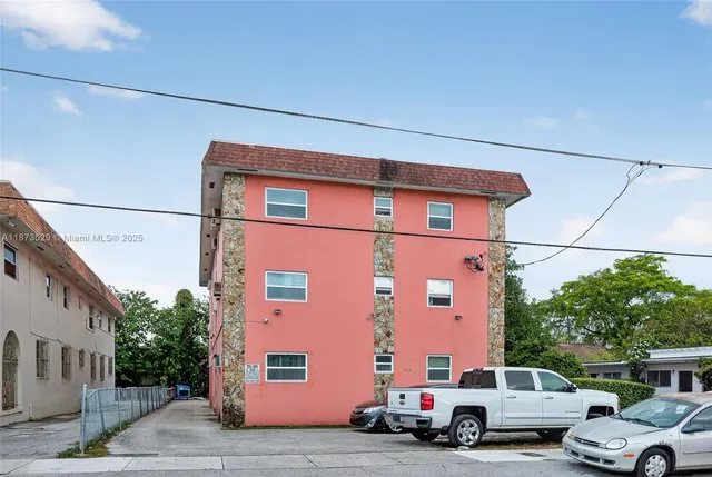 a view of a cars parked in front of a building