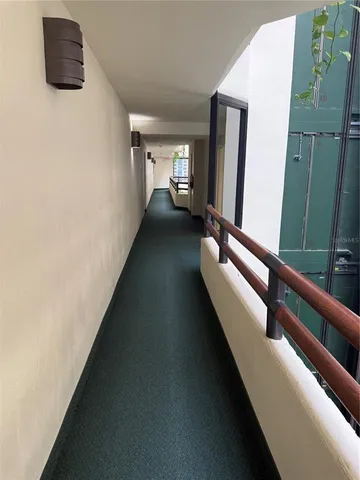 a kitchen with stainless steel appliances a stove a sink cabinets and a refrigerator