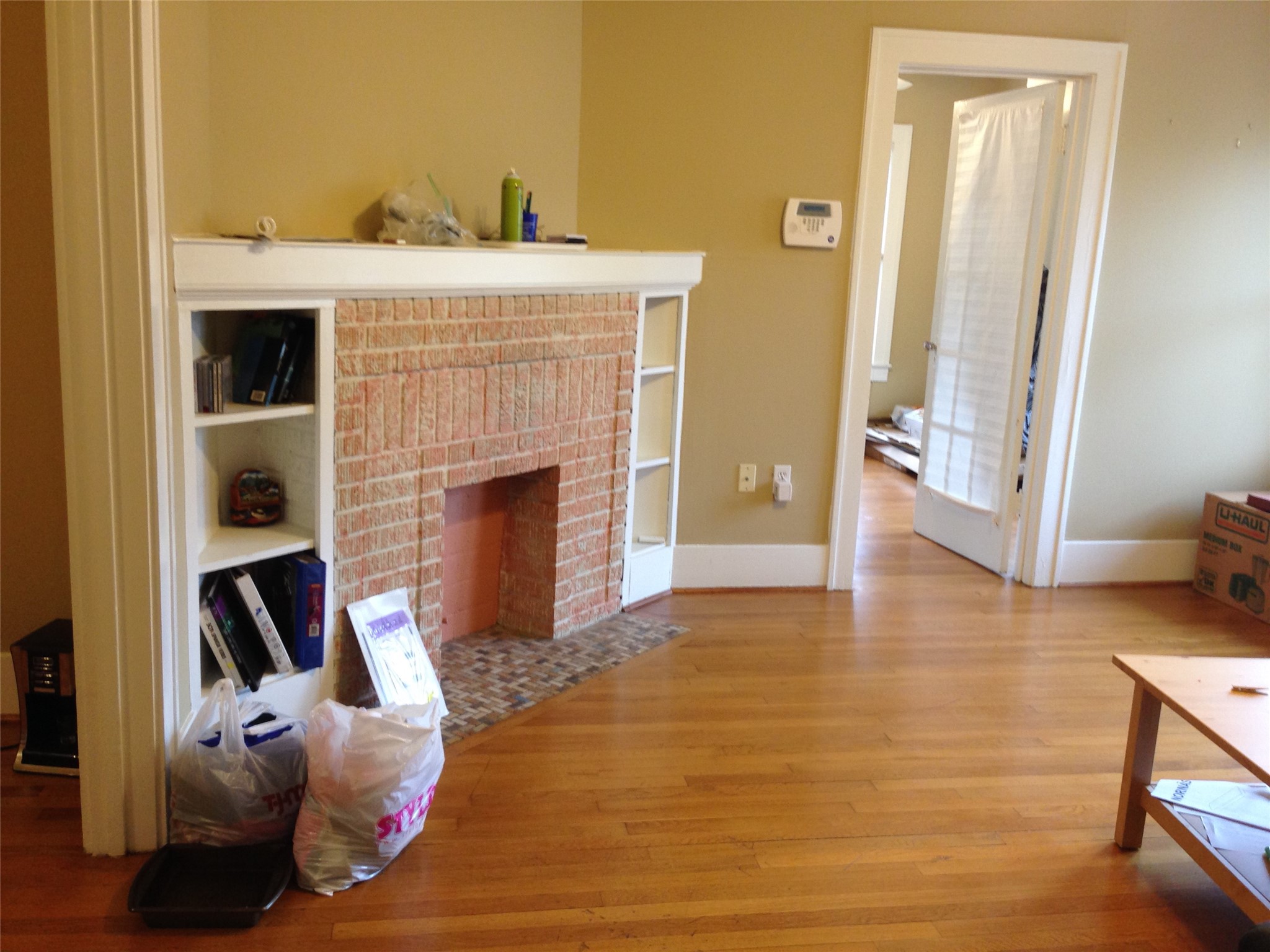 1719 Dunlavy Street Houston, TX 77006 - Photo 16 of 16 a living room with furniture and a fireplace