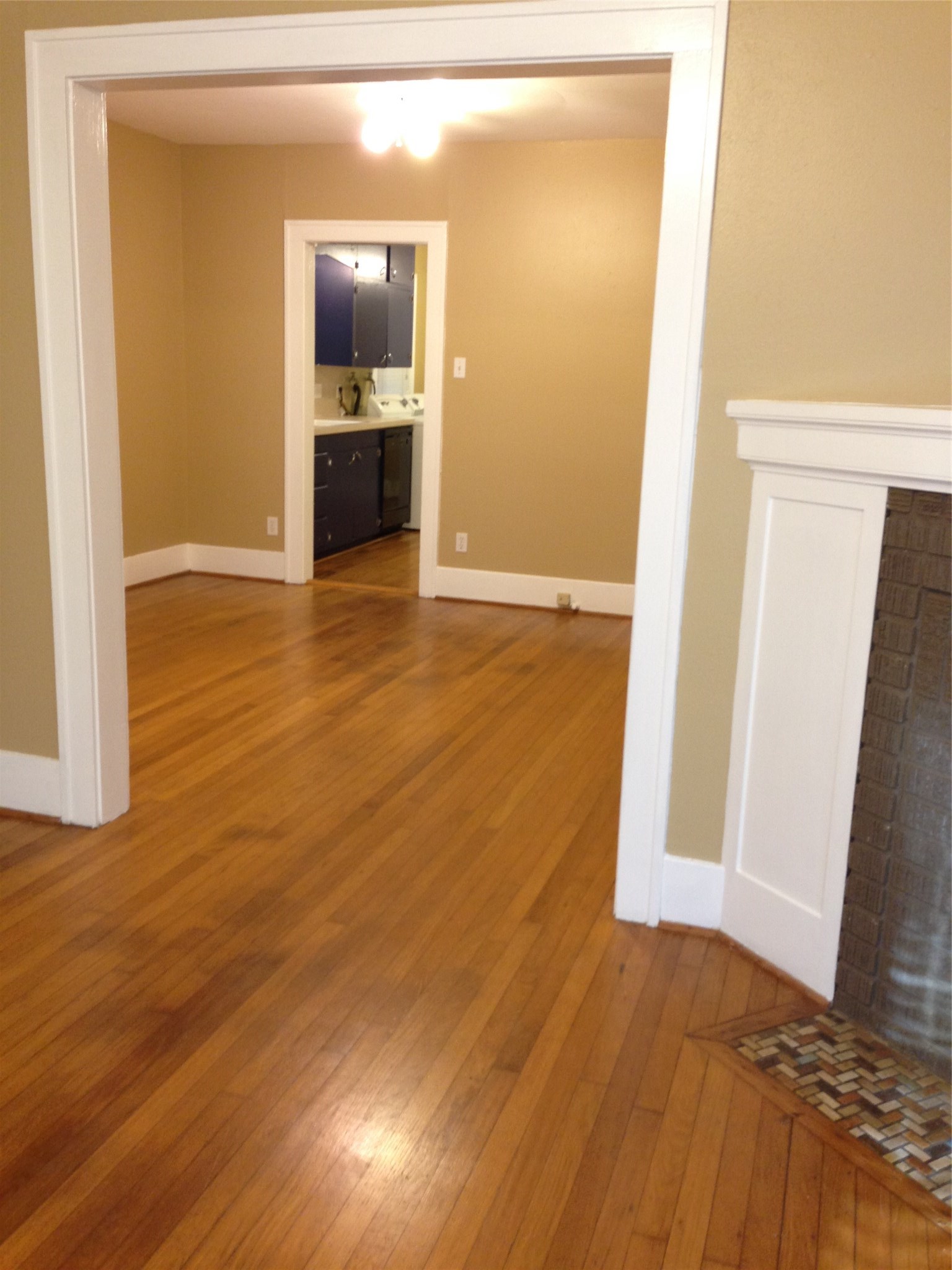 1719 Dunlavy Street Houston, TX 77006 - Photo 3 of 16 a view of a room with wooden floor and a bathroom