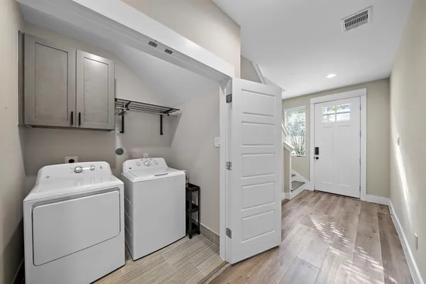 a bathroom with a bathtub and a sink