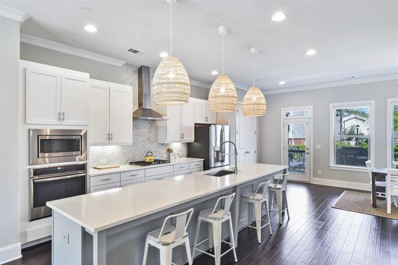712 Alden Drive Decatur, GA 30030 - Photo 1 of 1 a kitchen with stainless steel appliances a sink stove and cabinets