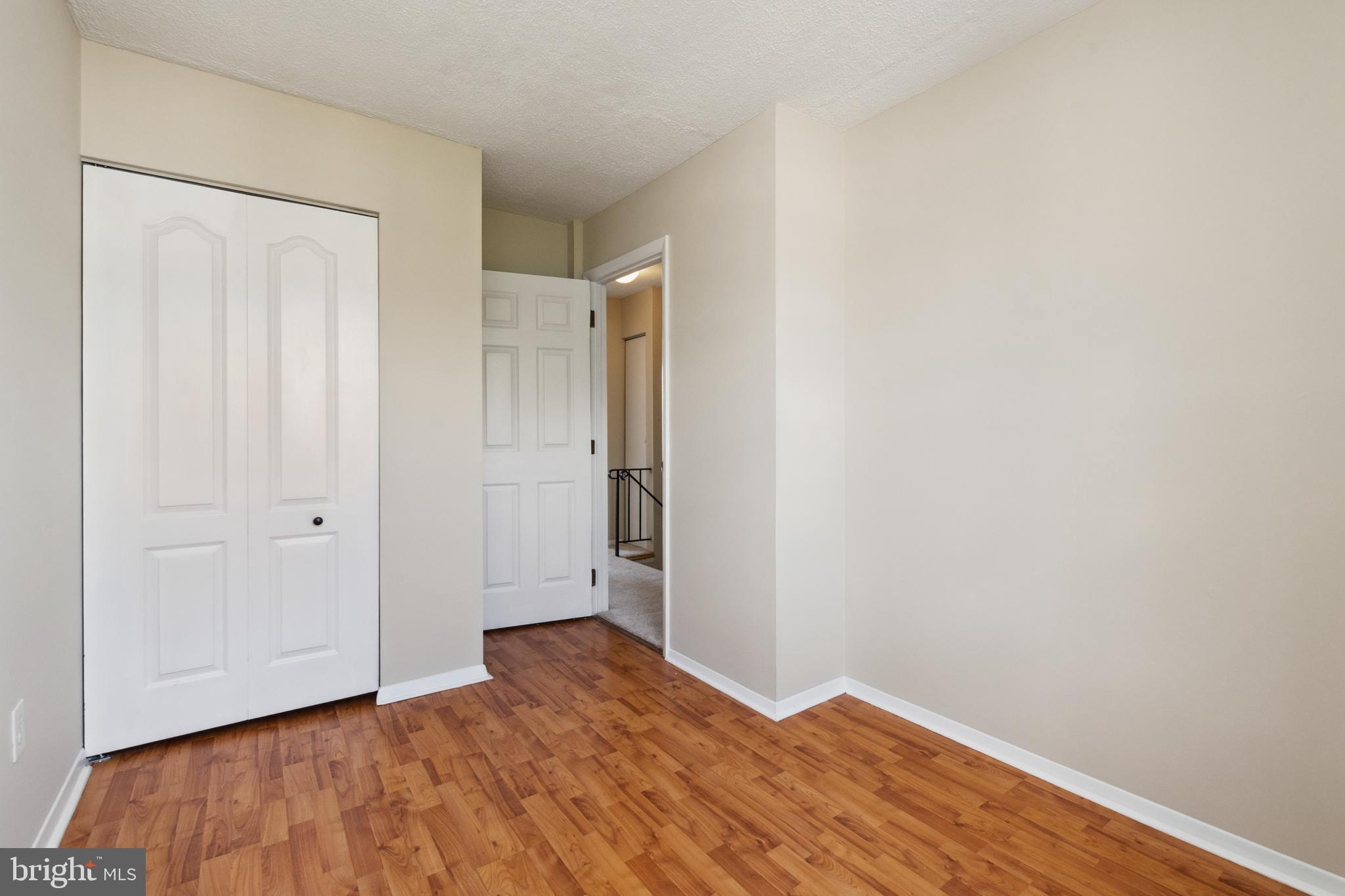 4041 Issacs Road Middle River, MD 21220 - Photo 22 of 36 a view of empty room with wooden floor