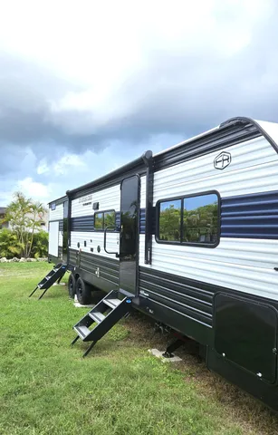 swimming pool with outdoor seating and yard