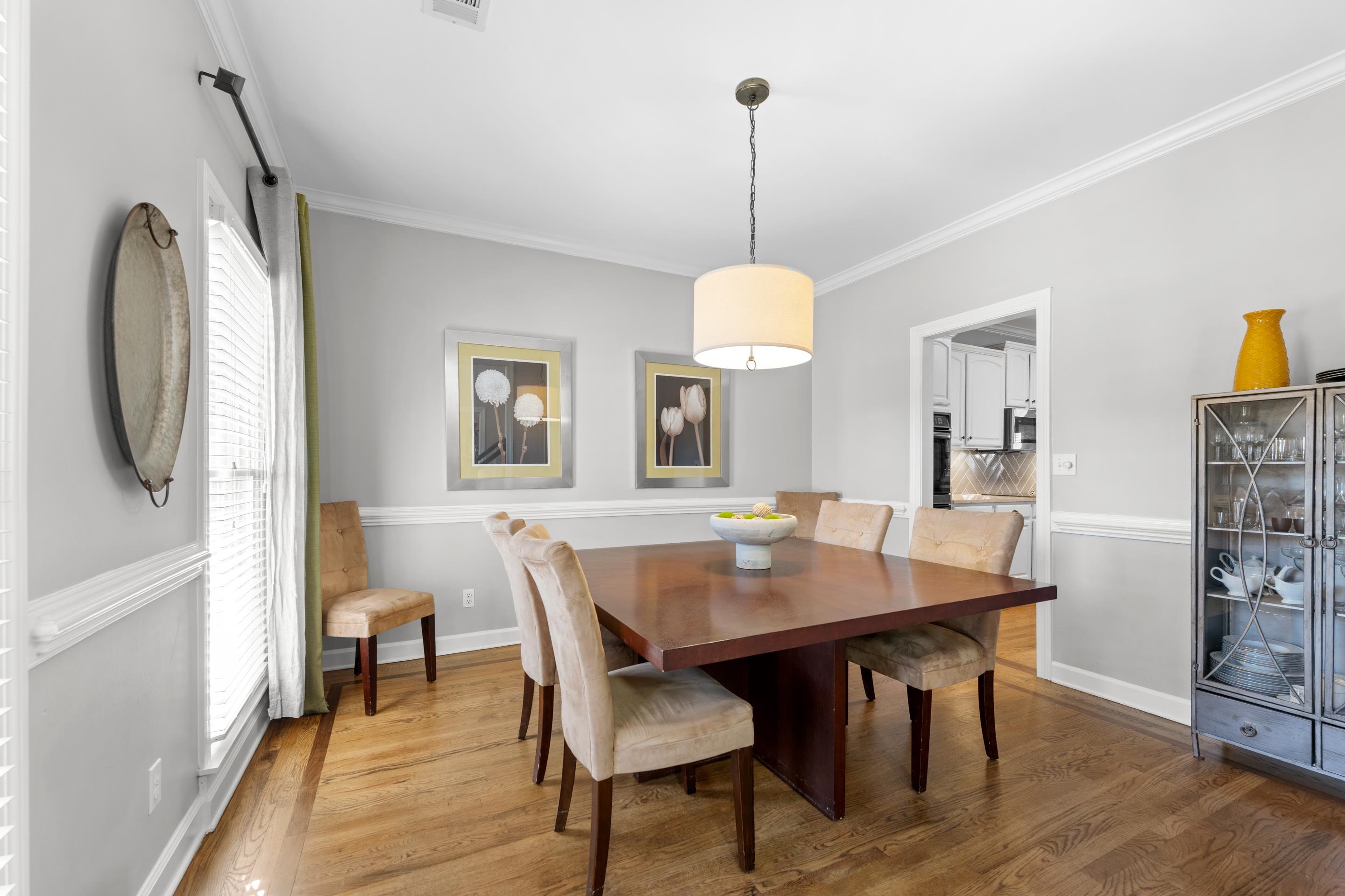 1339 Winoka Road Collierville, TN 38017 - Photo 11 of 40 a view of a dining room with furniture window and wooden floor
