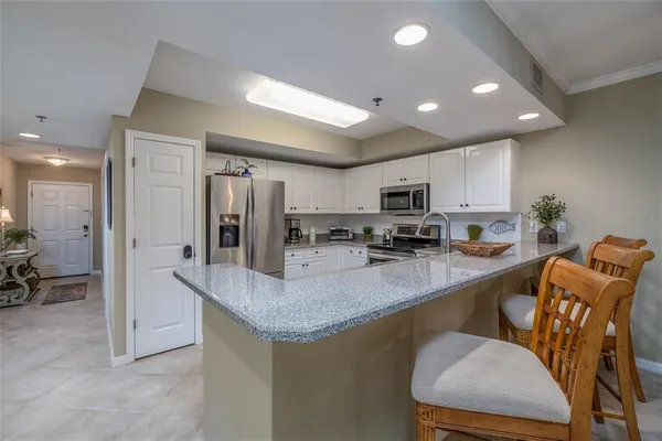 a view of balcony with couch and wooden floor