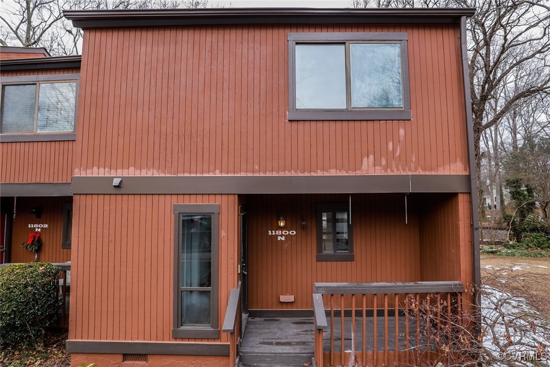 11800 North Briar Patch Drive Midlothian, VA 23113 - Photo 1 of 34 a view of a brick house with a door and a window