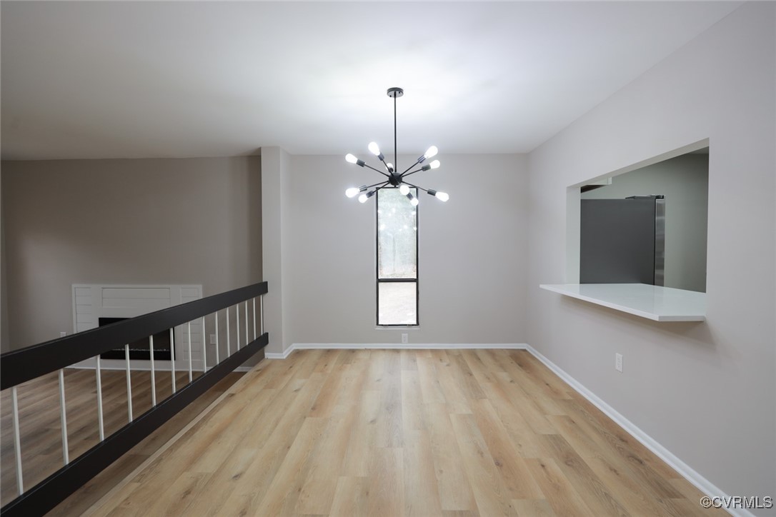 11800 North Briar Patch Drive Midlothian, VA 23113 - Photo 16 of 34 a view of a room with wooden floor fan and windows