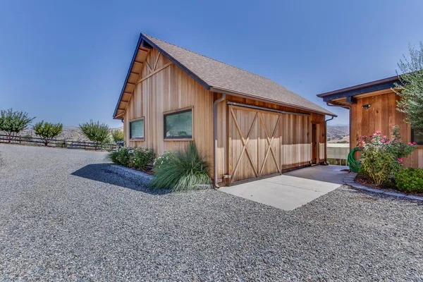a front view of a house having yard