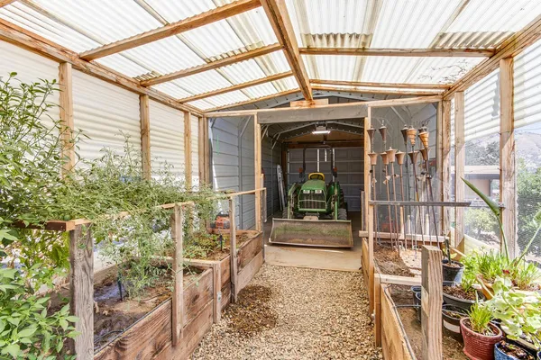 front view of a house with a potted plant