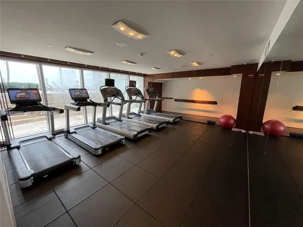 a view of a room with gym equipment