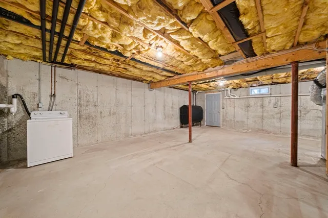 a view of a room with wooden walls