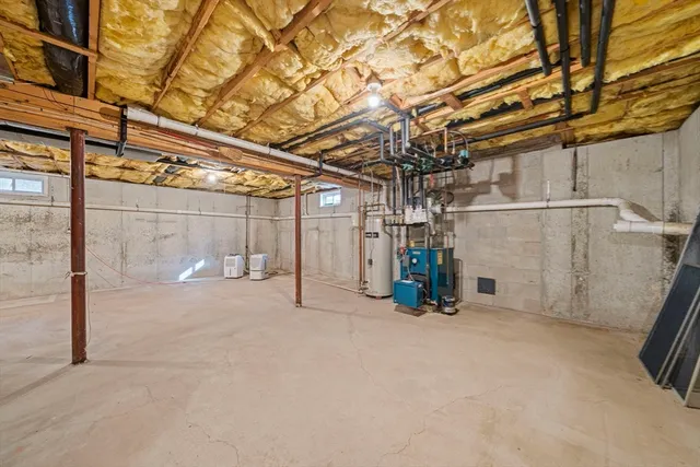 a view of a room with wooden walls