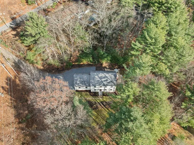 a view of a back yard of the house