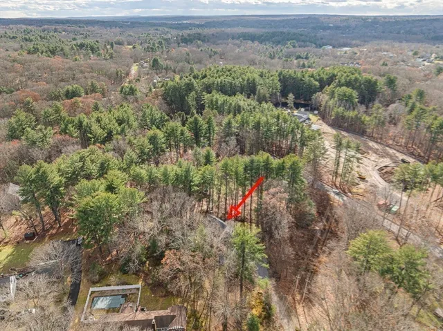 a view of a yard with an outdoor space