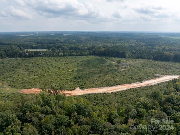 0 South Potter Road, Unit 3 Waxhaw, NC 28173 - Photo 3 of 13 a view of a lake with a yard