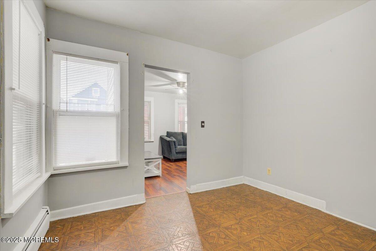 427 Howe Avenue Passaic, NJ 07055 - Photo 11 of 24 a view of empty room with a window