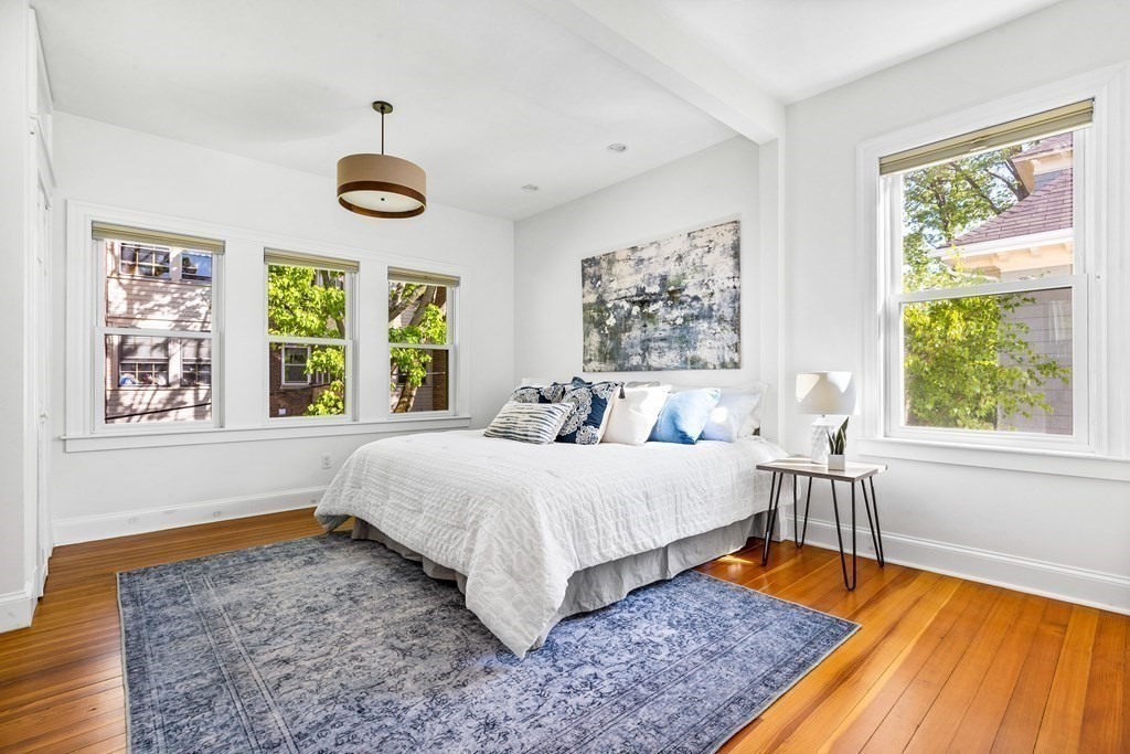 87 Coolidge Street, Unit 2 Brookline, MA 02446 - Photo 11 of 34 a bedroom with a bed and a large window