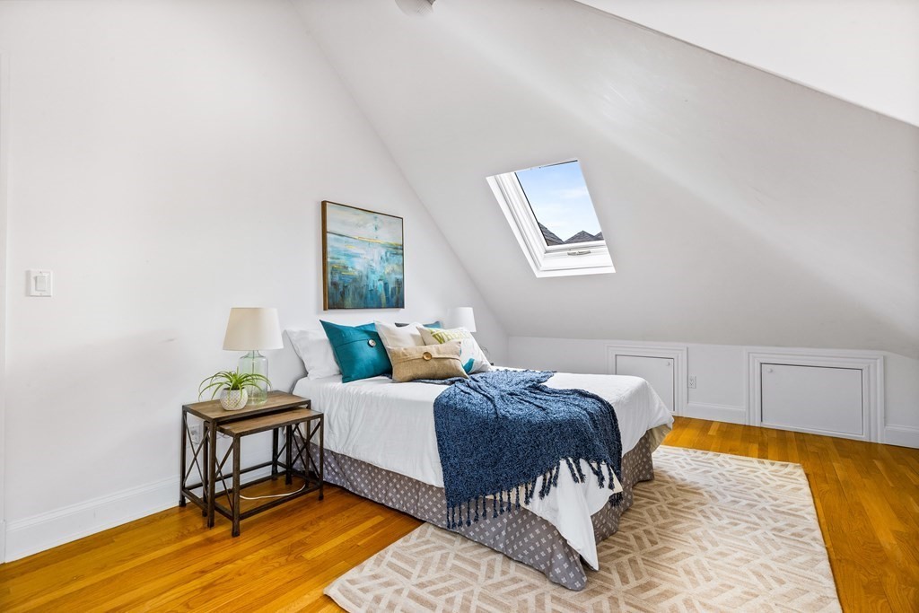 87 Coolidge Street, Unit 2 Brookline, MA 02446 - Photo 16 of 34 a bedroom with a bed and window