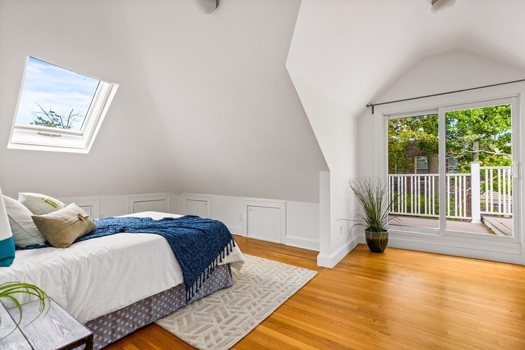 87 Coolidge Street, Unit 2 Brookline, MA 02446 - Photo 17 of 34 a bed sitting in a bedroom next to a window
