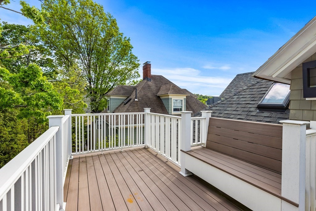 87 Coolidge Street, Unit 2 Brookline, MA 02446 - Photo 21 of 34 a view of balcony with wooden floor and fence