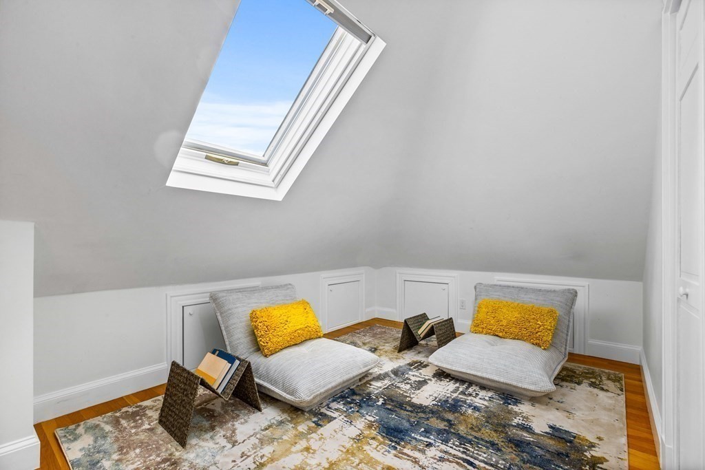 87 Coolidge Street, Unit 2 Brookline, MA 02446 - Photo 27 of 34 a living room with furniture and a window