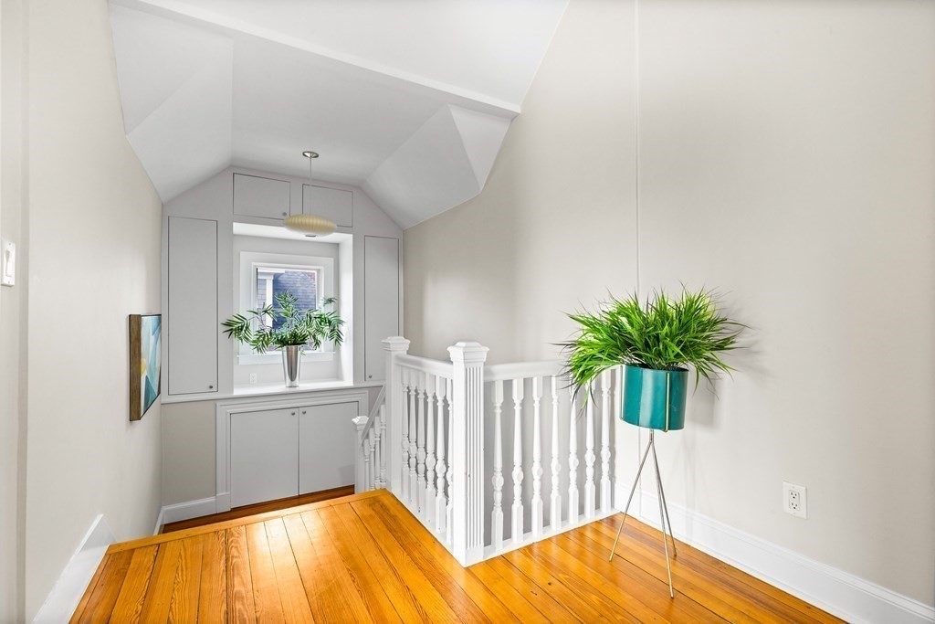 87 Coolidge Street, Unit 2 Brookline, MA 02446 - Photo 28 of 34 a view of a bedroom and wooden floor