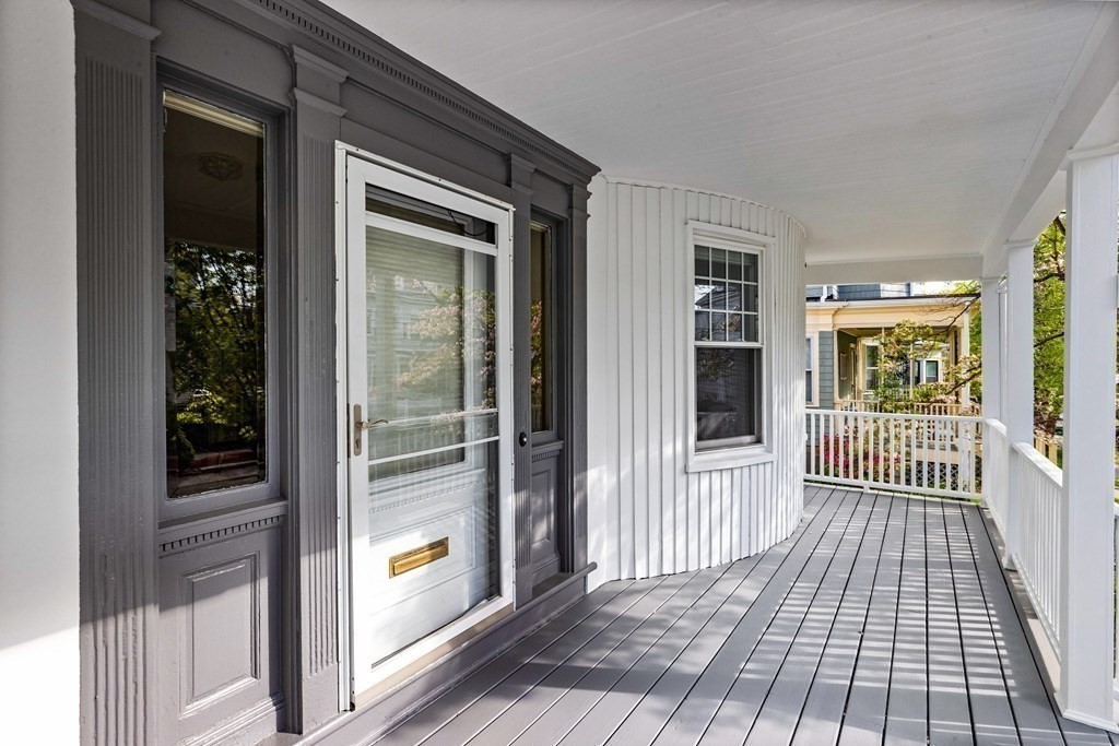 87 Coolidge Street, Unit 2 Brookline, MA 02446 - Photo 30 of 34 a view of a balcony with wooden floor