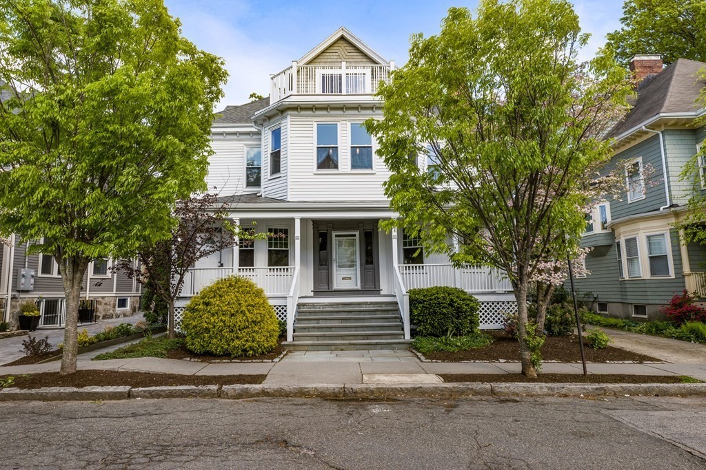 87 Coolidge Street, Unit 2 Brookline, MA 02446 - Photo 32 of 34 a front view of a house with garden