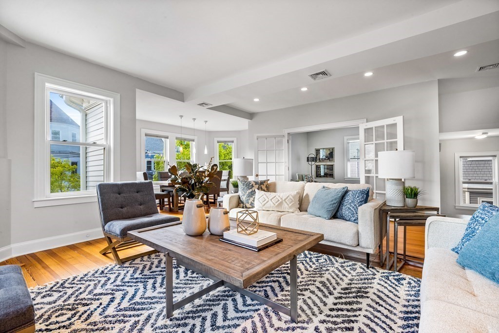 87 Coolidge Street, Unit 2 Brookline, MA 02446 - Photo 4 of 34 a living room with furniture and wooden floor