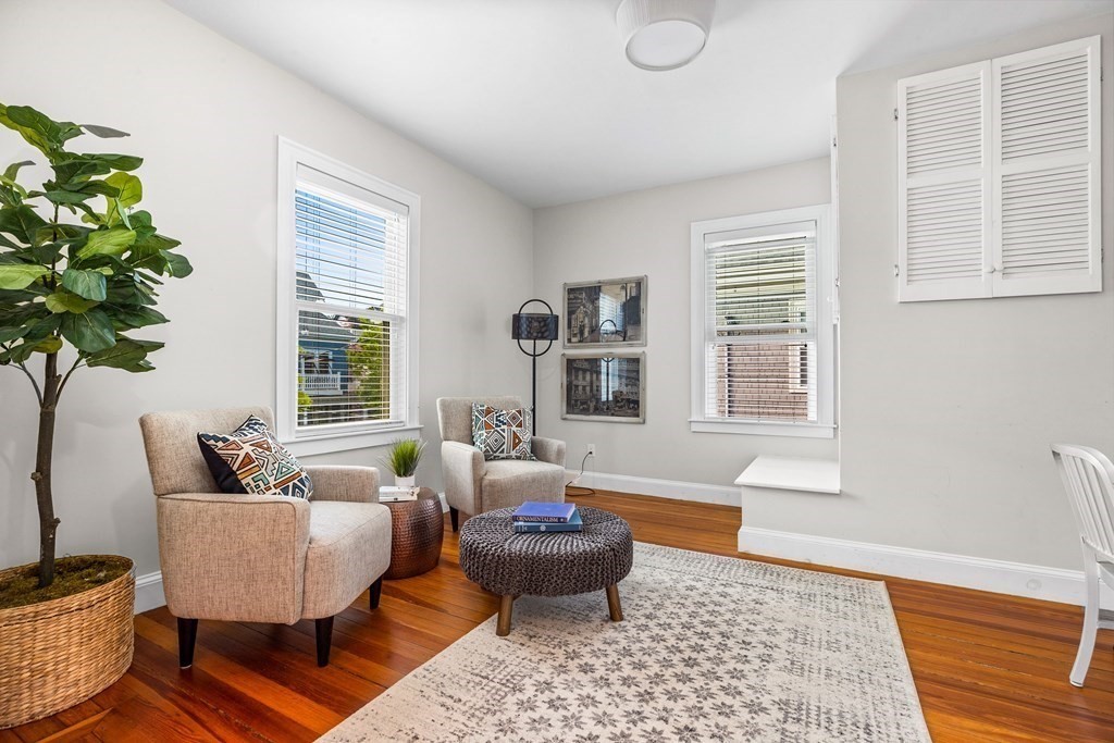 87 Coolidge Street, Unit 2 Brookline, MA 02446 - Photo 8 of 34 a living room with furniture and a potted plant