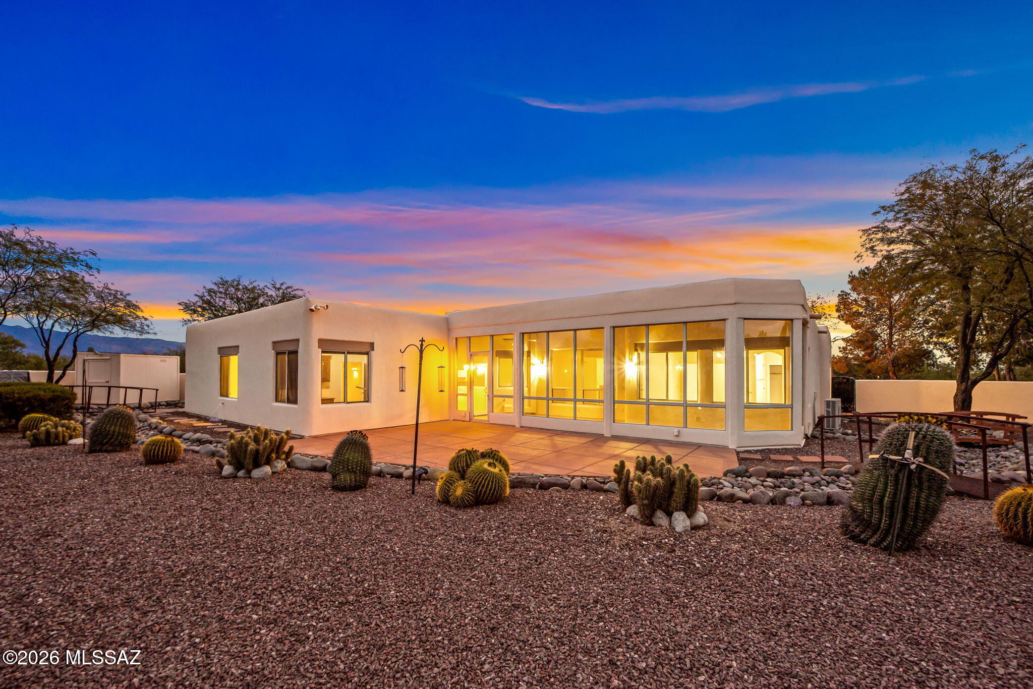 3655 North Harrison Road Tucson, AZ 85749 - Photo 45 of 51 a view of a house with a patio