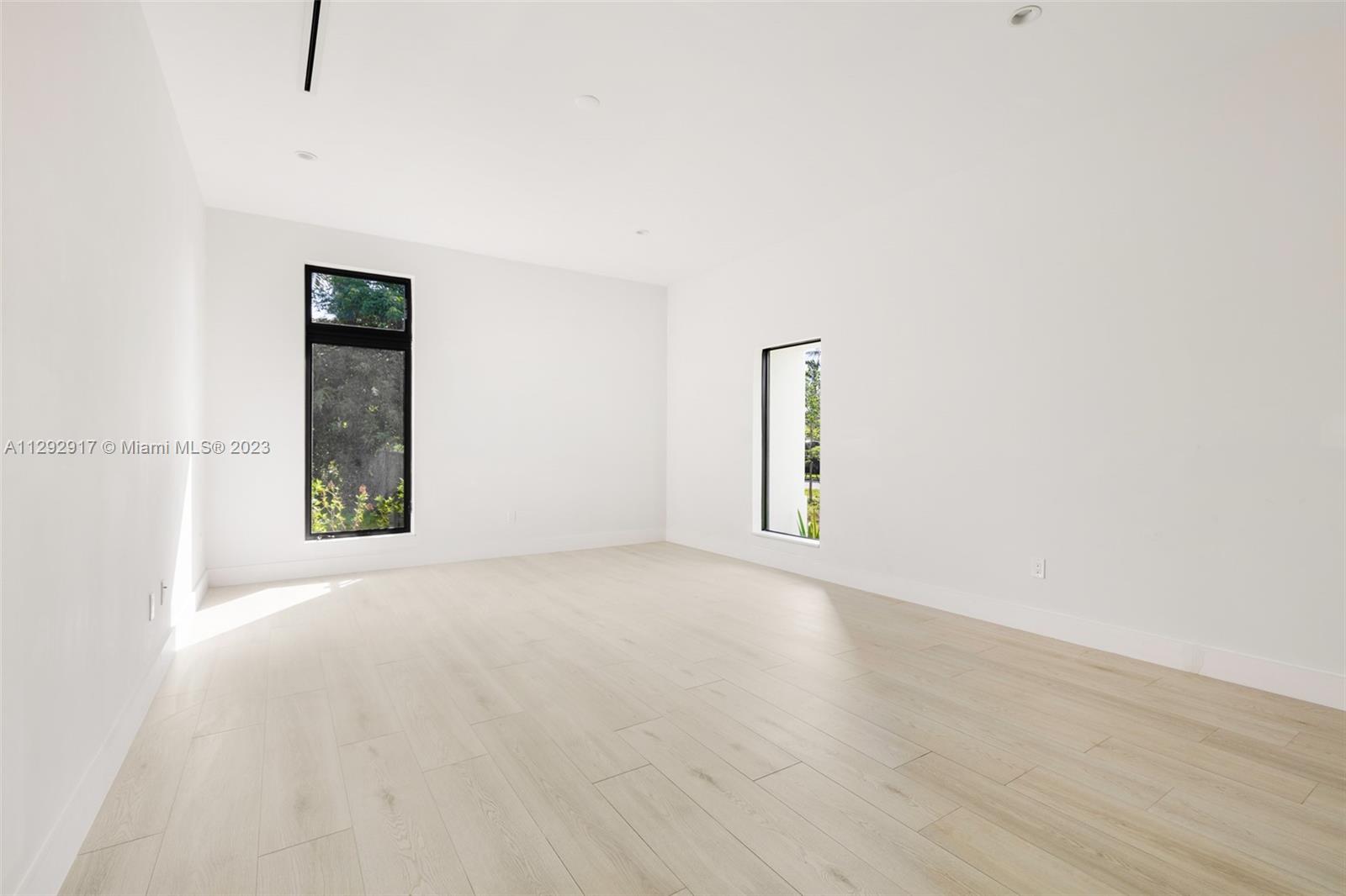 491 Ranch Road Weston, FL 33326 - Photo 30 of 46 a view of an empty room with window